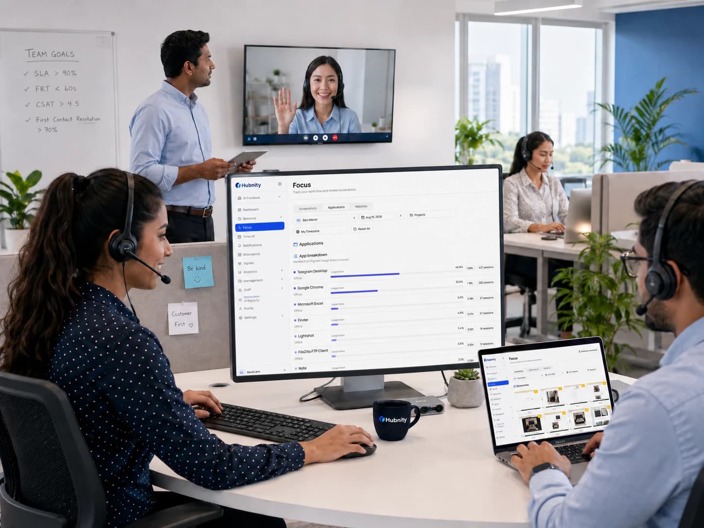 Call center managers reviewing agent performance and workforce analytics