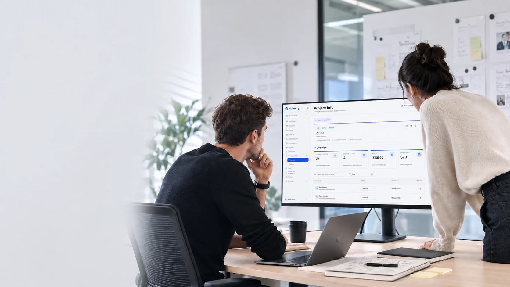 Team reviewing a Hubnity project board